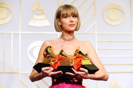 taylor with her 3 grammy awards